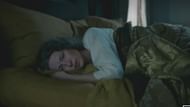 Claire mourns Jamie's death in Outlander season 7 episode 10 (image via Netflix)